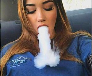 hot girl smoking a smoke dick